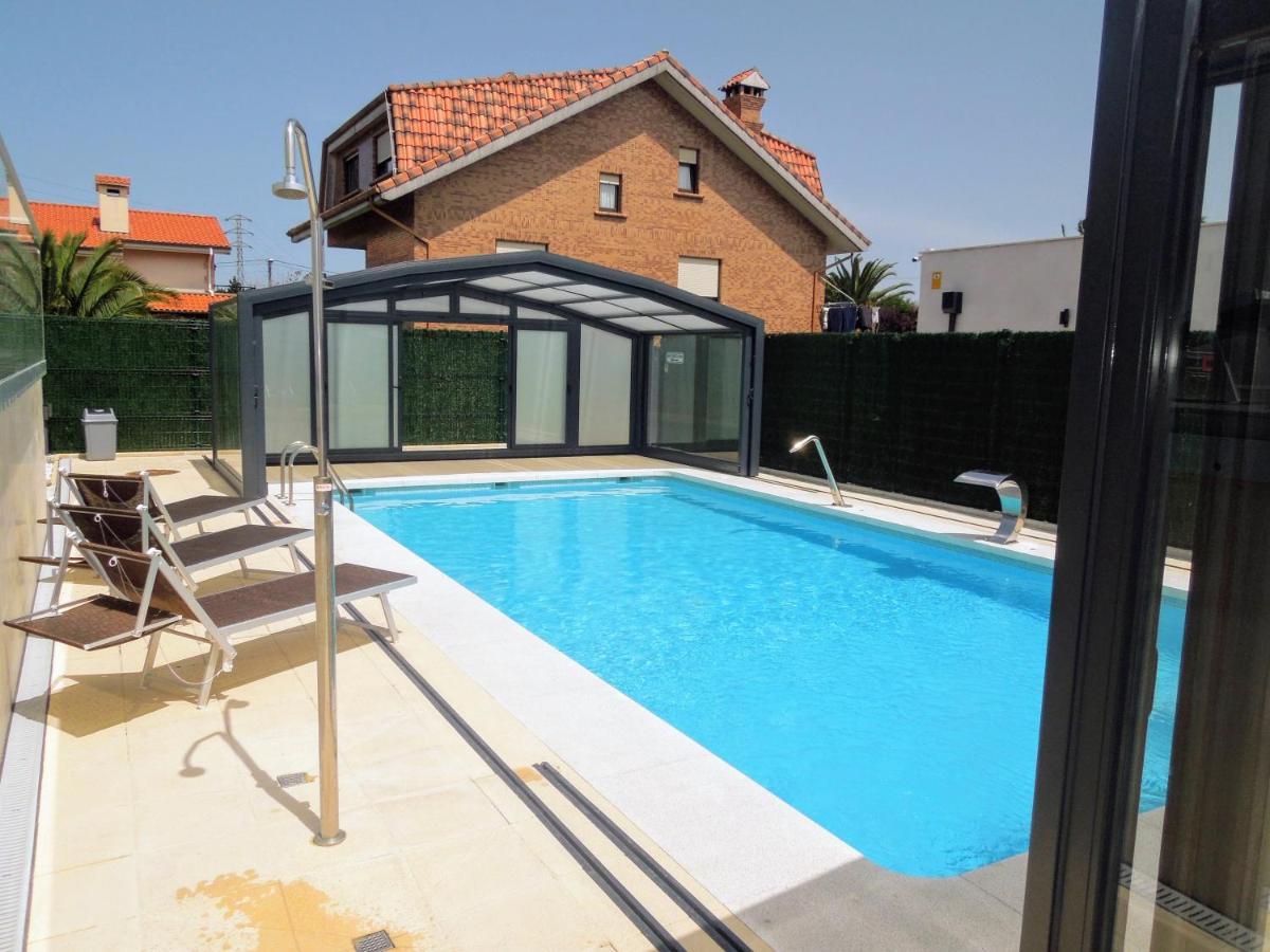 Apartamentos Playa De Covachos Soto de la Marina Bagian luar foto
